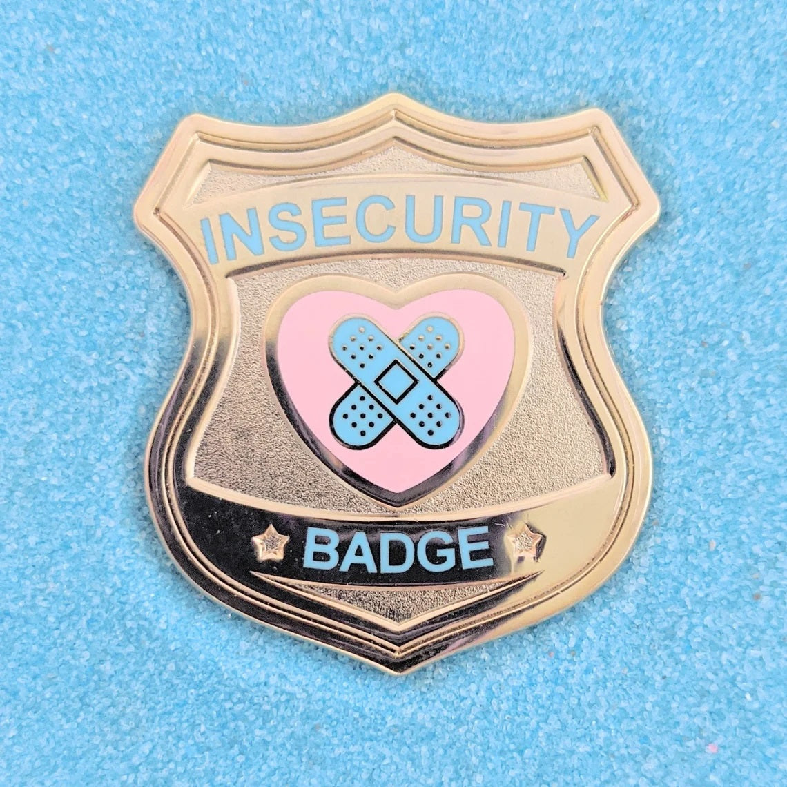insecurity badge pin